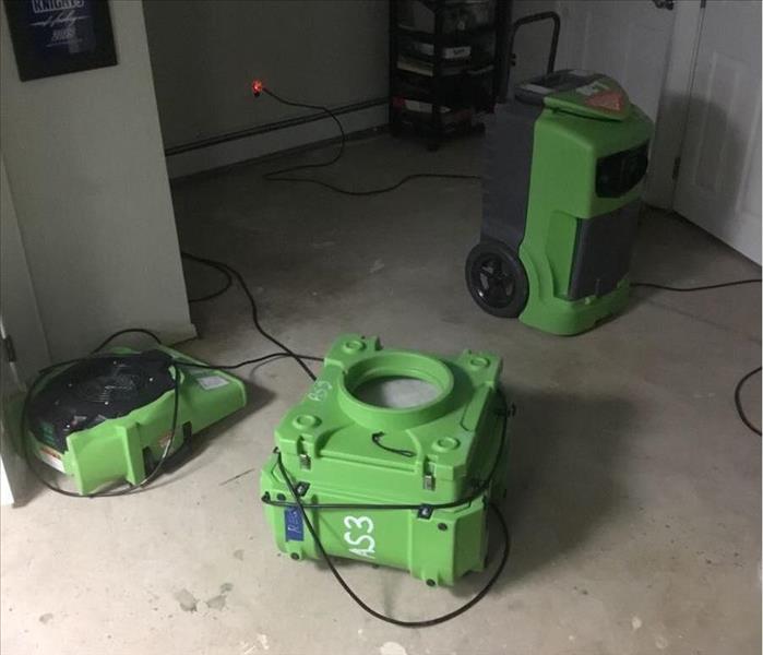 water damage, removal of carpet. place equipment